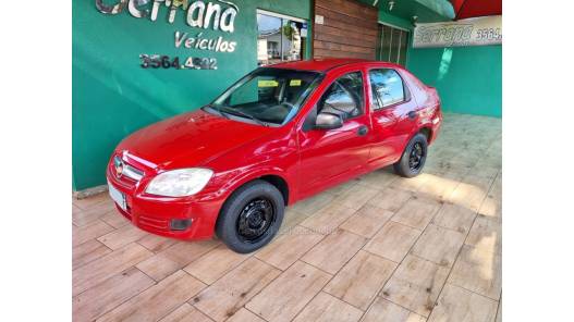 CHEVROLET - PRISMA - 2009/2010 - Vermelha - R$ 24.900,00